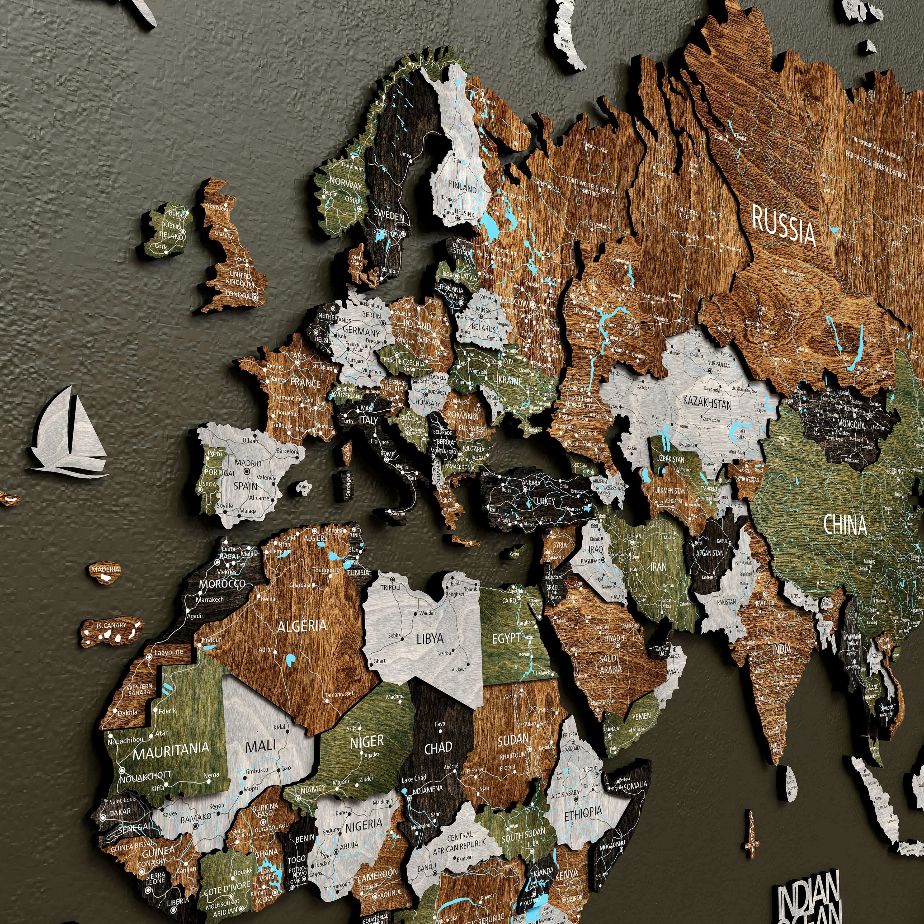 3D wooden wall map of Europe and Asia in rustic style, showcasing layered design and geographical details.