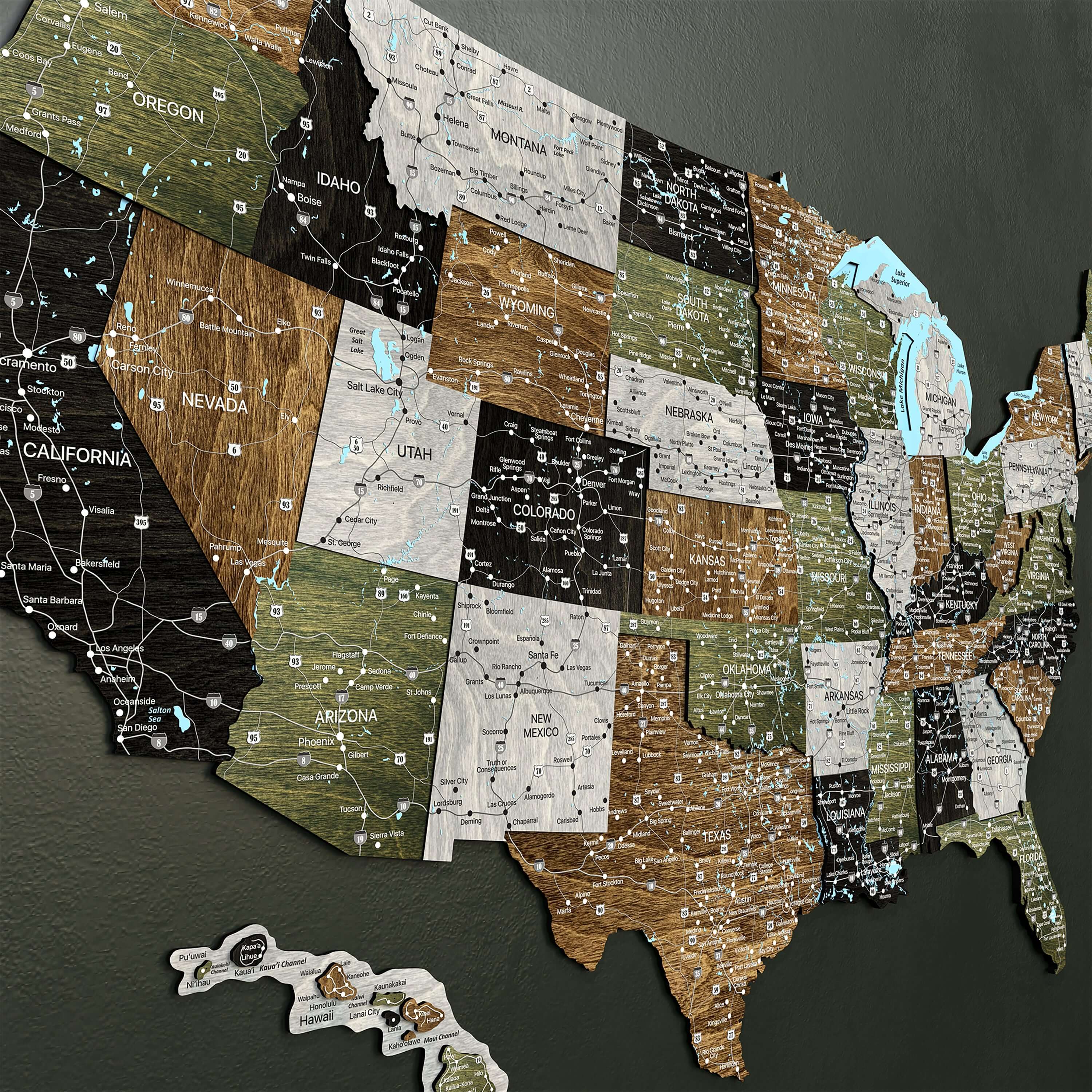 Rustic 3D wooden map of the USA, showcasing detailed state outlines and transport routes on a dark wall.