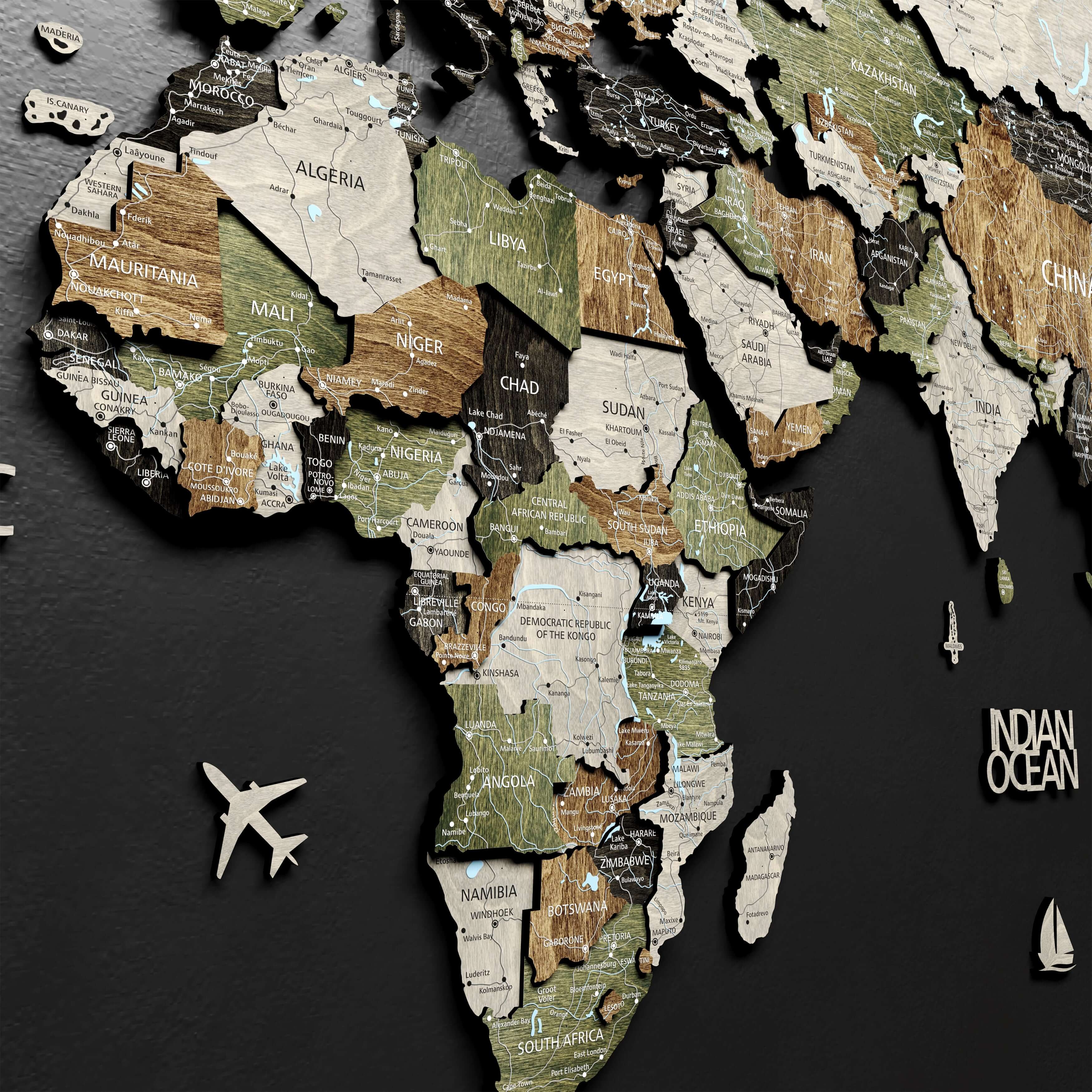 3D wood world map mounted on a wall, demonstrating its size and impact as wall art.