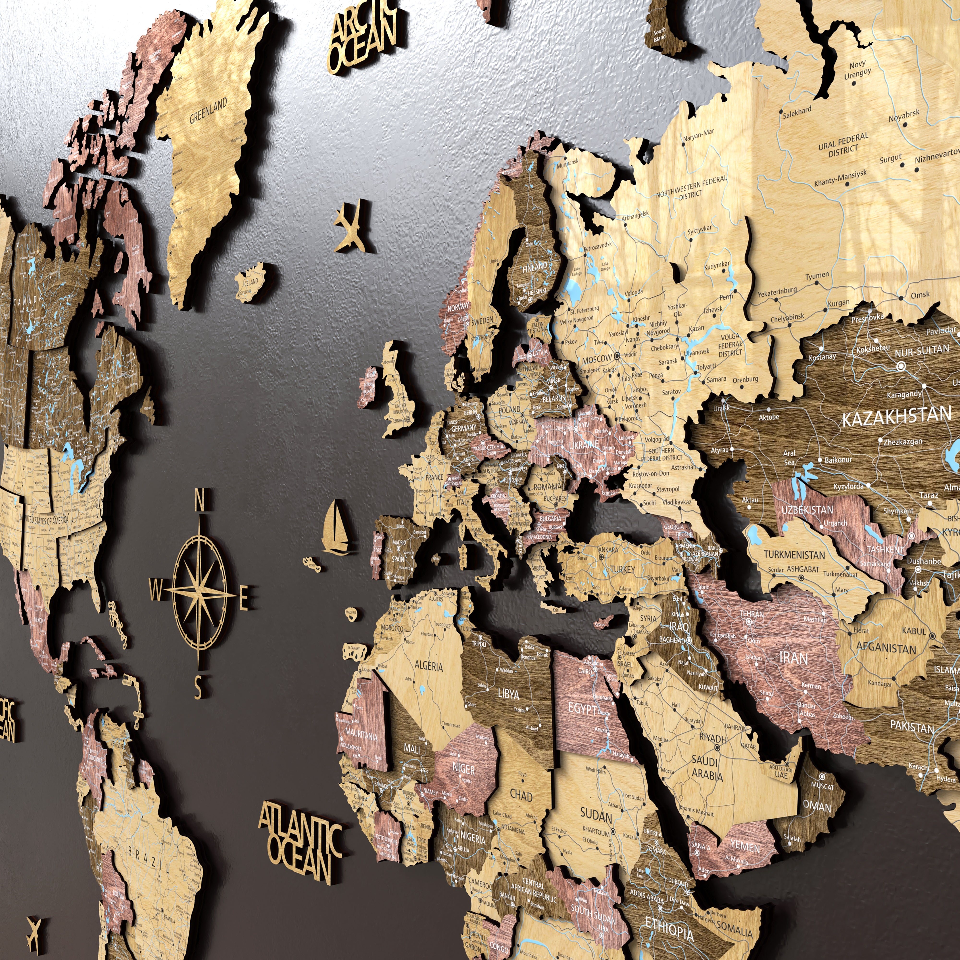 3D Wood world map wall decor displayed on a black background, featuring intricate details of continents and oceans.